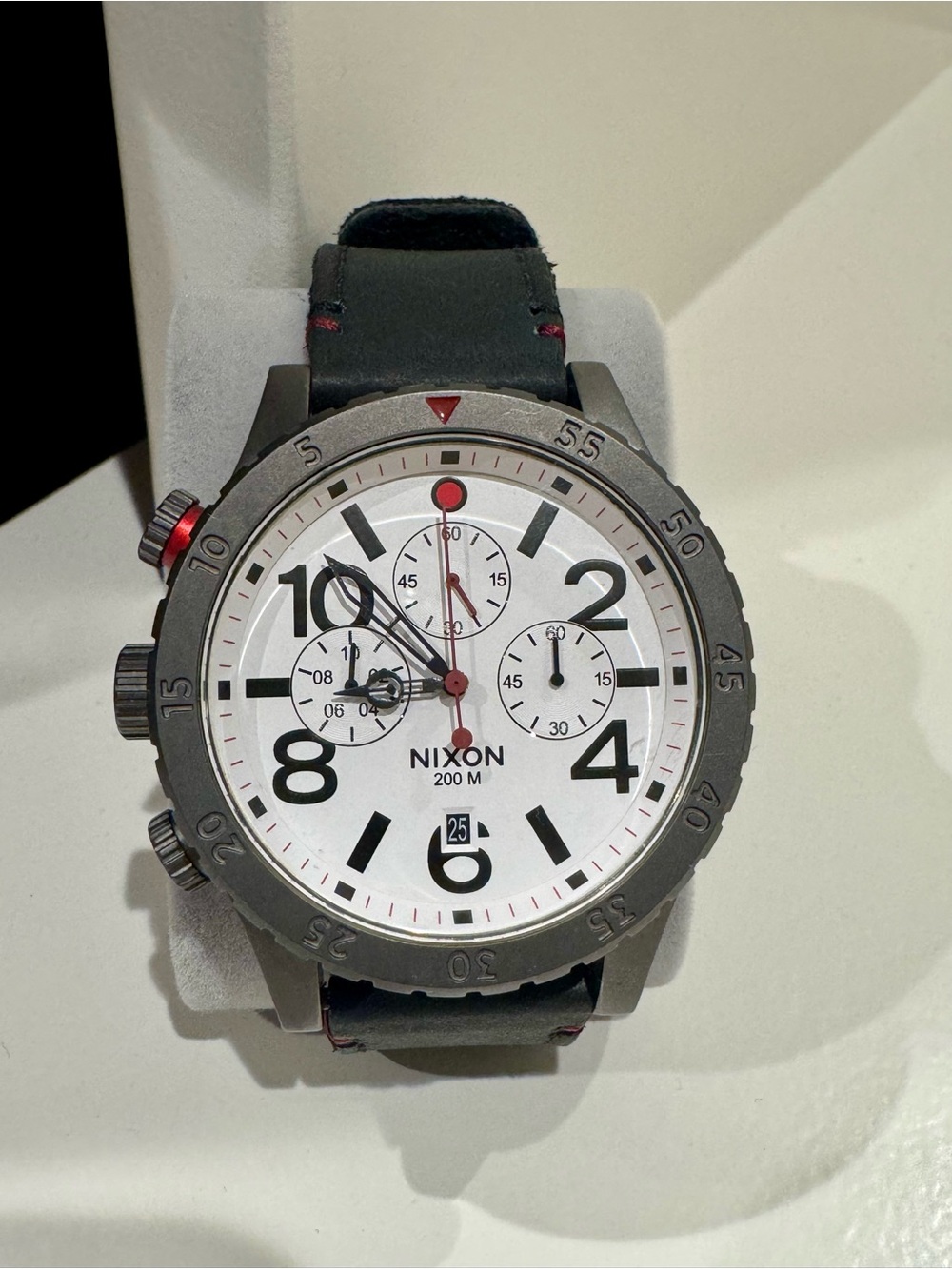 Nixon Men’s White Dial 48-20 Chronograph Watch with Black Strap and Red Accents